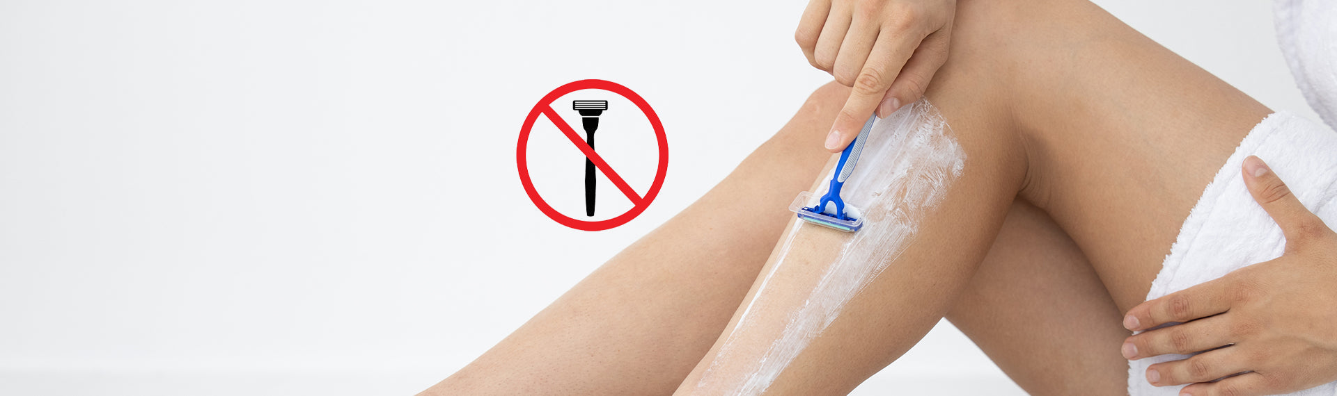 A person shaving their legs with a razor and a red 'no' symbol indicating to quit shaving.